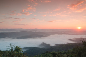 Beautiful clouds and fog among mountain landscape.
