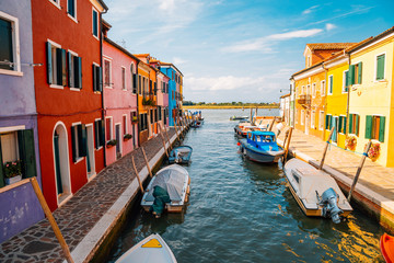 Fototapeta na wymiar Colorful buildings and canal in Burano island, Venice, Italy