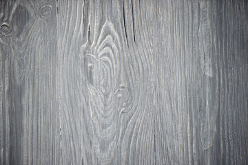 Wood texture. Gray timber board with weathered crack lines. Natural background for shabby chic design. Grey wooden floor image. Aged tree surface close-up backdrop template