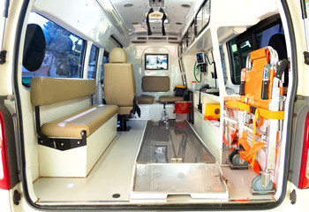 Inside an ambulance with medical equipment . Car for patient refer . © oatautta