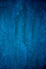 Dark blue and blue background smeared with brushes.