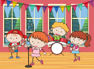 Obraz na płótnie Canvas Four kids playing music in the band