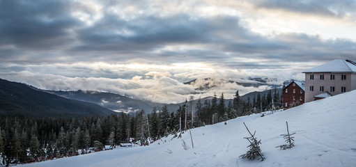 Naklejka premium Panorama snow mountains landscape. Sunrise over Carpathian mountain in Ukraine.