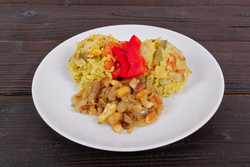 Risotto with vegetables and nuts on a table