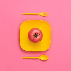 Tomato Fresh on plate. Food Organic Vegan Concept. Colorfull Vegetables. Flat lay. Trendy fashion Style. Minimal Design Art. Hot Summer Vibes. Bright Pink Yellow Color.