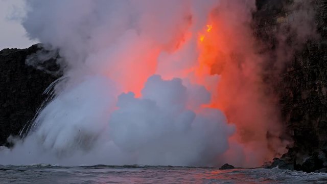 Lava from the Kīlauea volcano flows into the ocean on the Big Island of Hawaii