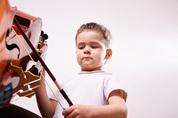 Little boy with cello