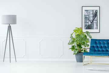 Spacious room with standing lamp