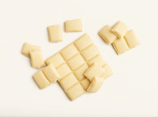 Bar of dark chocolate isolated on white