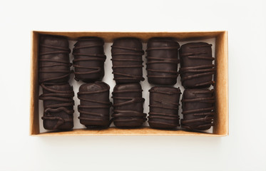 Obraz premium Vegan candies in box isolated on white