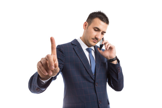 Busy salesman taking a call.