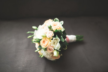 Beautiful wedding bouquet with different flowers, roses