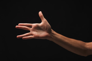 Man hand gesturing in the form of crocodile