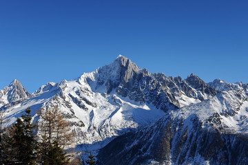 Fototapeta na wymiar France. The tops of the Alps in the evening in the village Chamonix