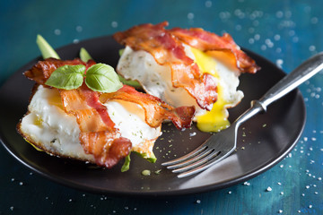 Breakfast sandwich with egg and bacon