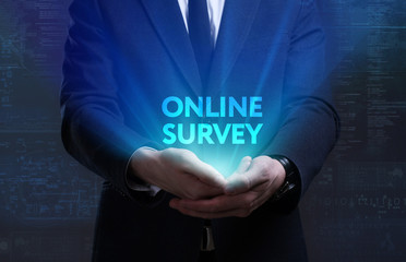 Business, Technology, Internet and network concept. Young businessman working on a virtual screen of the future and sees the inscription: Online survey