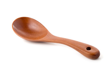 Wooden spoon isolated on a white background