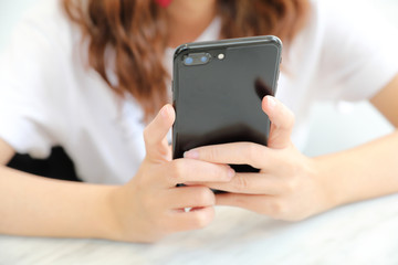 Asian woman hand used smartphone