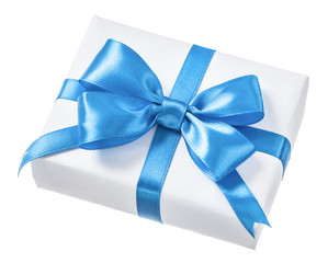 Wrapped white present box with blue bow isolated on white