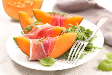 melon slice and prosciutto