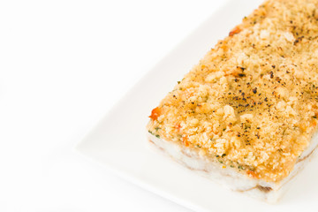 White fish casserole with cheese isolated on white background. Copyspace
