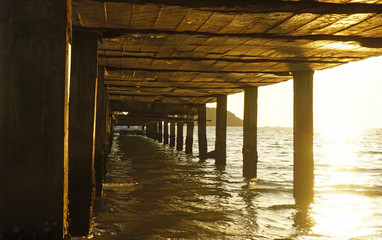 wooden jetty in the sunset