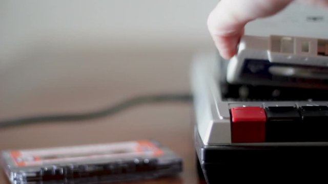 Eject cassette tape player, insert cassette and press play