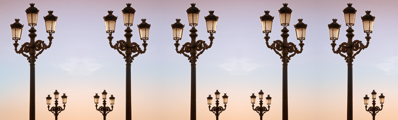 Fototapeta na wymiar Street lanterns at dusk.