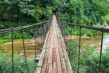 Suspension bridge, Crossing the river, ferriage in the woods,