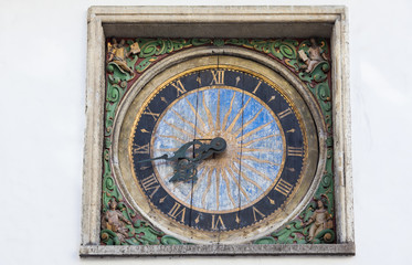 Ancient clock on the wall of the Church of the Holy Spirit in Old Tallinn, master Christian Ackerman 1684