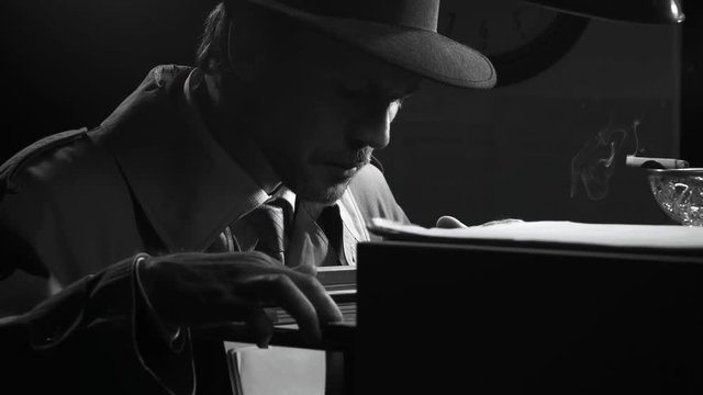Spy searching files in the cabinet