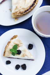 Pie with meringue and berries