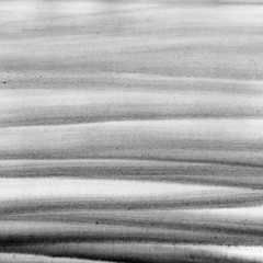 Black and white stripes background. Hand painted waves.