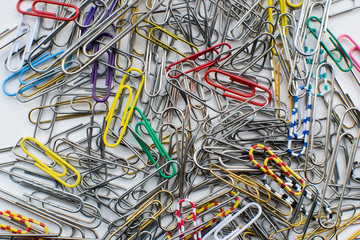 stationery paper clips on white isolated background