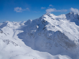 Fototapeta na wymiar Skiing slope in the French Alpes. Region 3 Vallees, Meribel and Courchevel. Winter, 2018