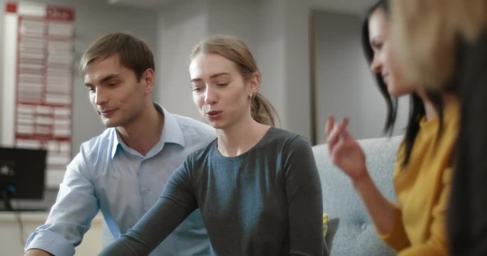 Young married couple is getting advice on the interior issue