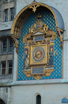 decorated antique clock with colorful figures