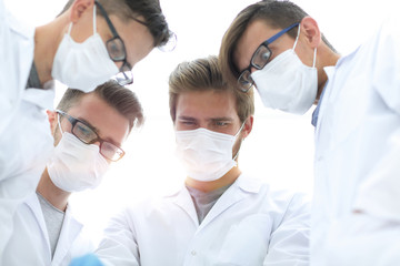 closeup.the surgical team in the operating room.