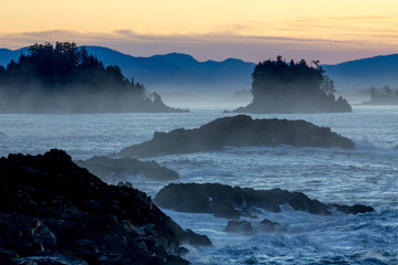 Pre-dawn light, rocky silhouettes and ocean near Ucluelet, Canada.