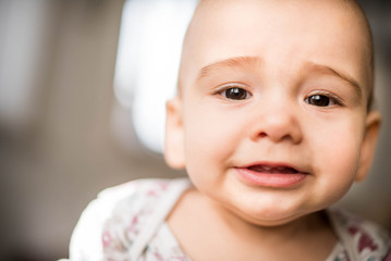 Funny baby looking at the camera
