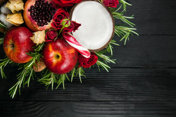 Fruit bouquet  with apples, roses and pomegranate.