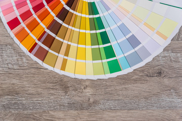 Colour sampler for painting on wooden background
