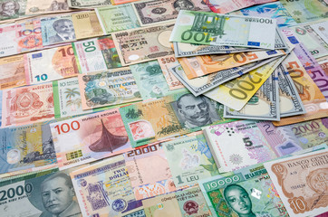 Obraz na płótnie Canvas Euro and dollar banknotes on world money collection