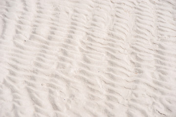 Obraz premium White sand beach background texture