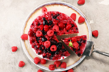 raspberry cake and many fresh raspberries