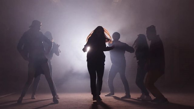 Concept of dancing at disco party. Having fun with friends.