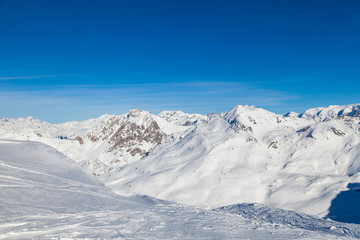 Winter panorama of snowy mountain ridge in 3 Valleys skiing, snowboard resort, Alps, France