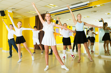 Children learn dance movements