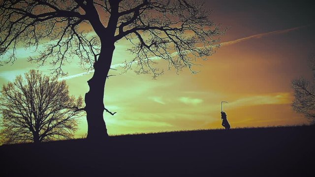 At sunset there is a grim Reaper