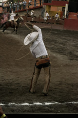 Mexican charro flourishing the rope